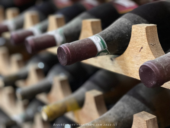 Dusty bottles shelf